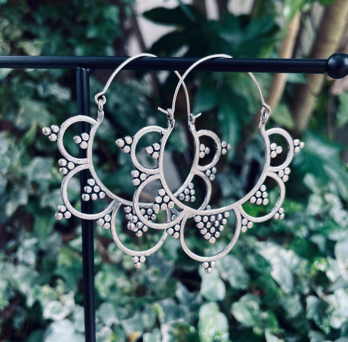 Statement silver boho earrings.