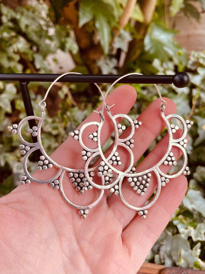 Statement silver boho earrings.