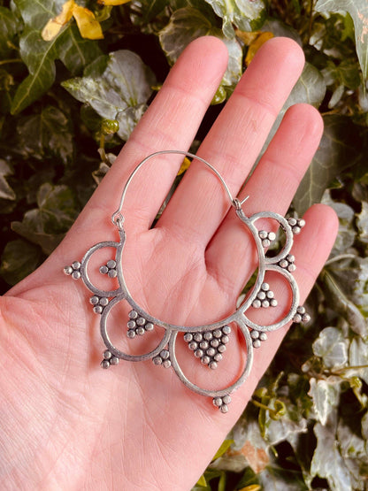 Statement silver boho earrings.